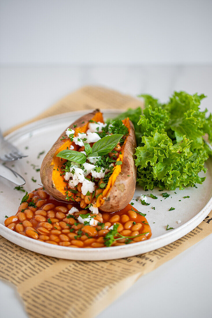 Stuffed sweet potato with feta and baked beans