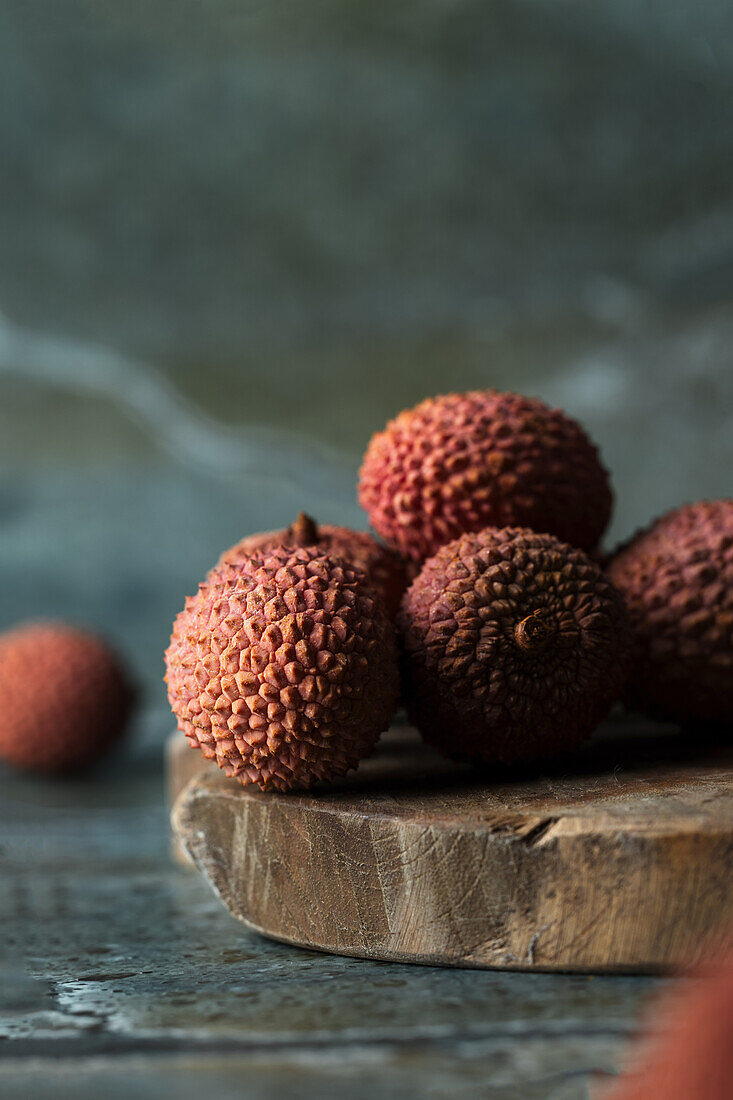 Lychees on a wooden board