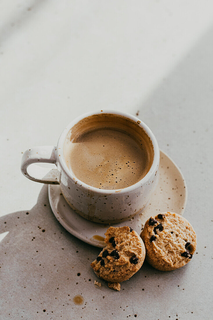 Coffee and chocolate cookies and a cup of coffee