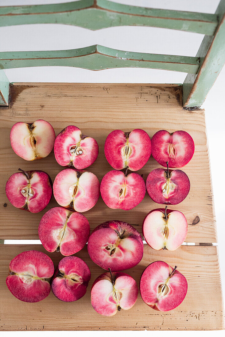 Halved red-fleshed apples