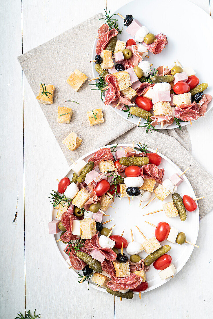 Colourful skewers with sausage, cheese and vegetables