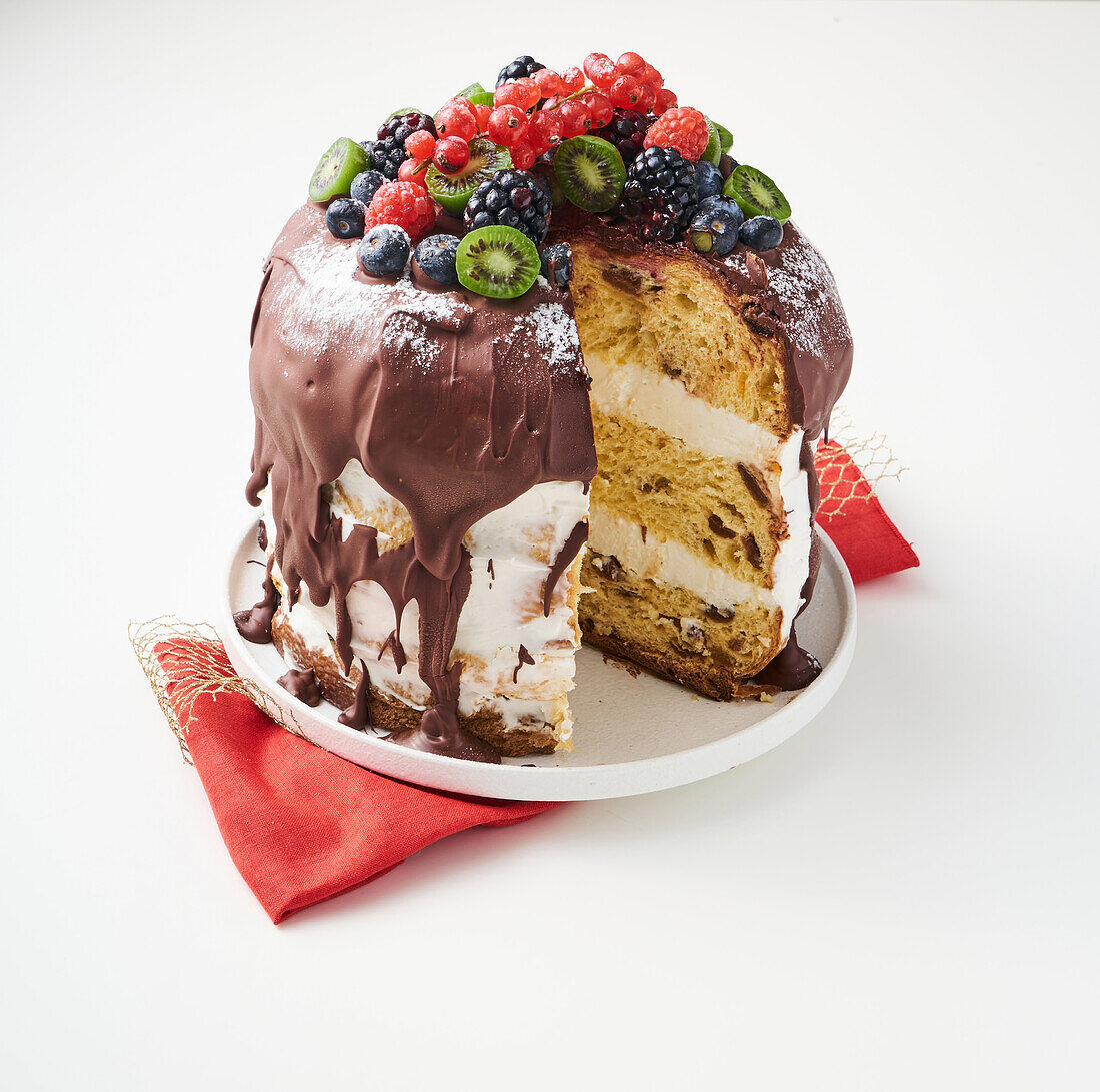 Stuffed panettone garnished with fresh fruit