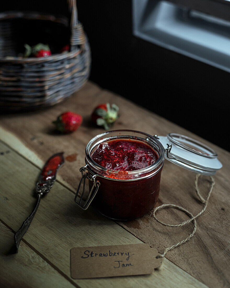 Strawberry jam in a lidded jar