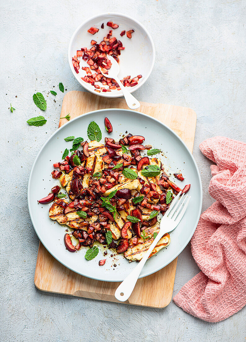 Grilled halloumi cheese with cherry salsa and mint
