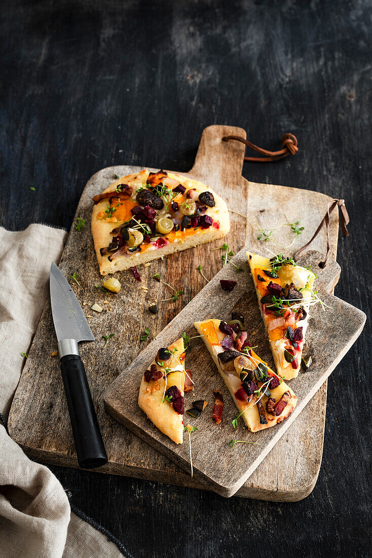 Focaccia with vegetables and grapes