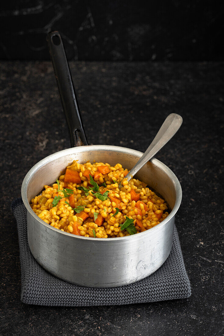 Barley curry in a saucepan