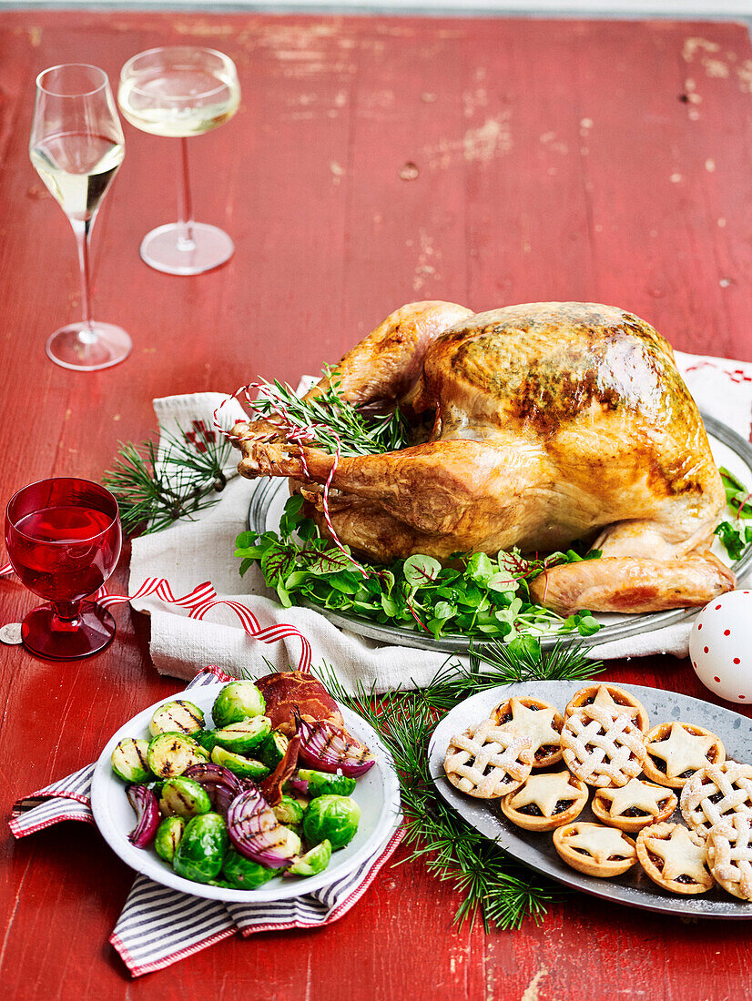 Roast turkey with herb butter, prosciutto and pear stuffing