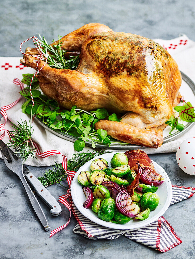 Roast turkey with herb butter, prosciutto and pear stuffing