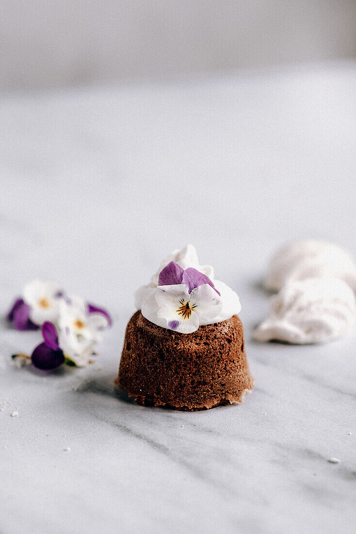 Chocolate cupcakes with edible pansies