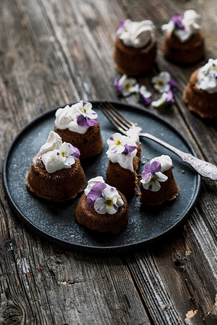 Chocolate cupcakes with edible pansies
