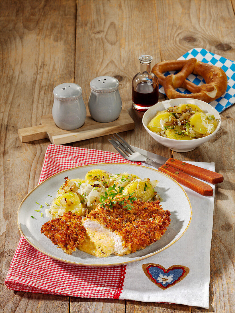 Bavarian cordon bleu with Obatzda and potato salad