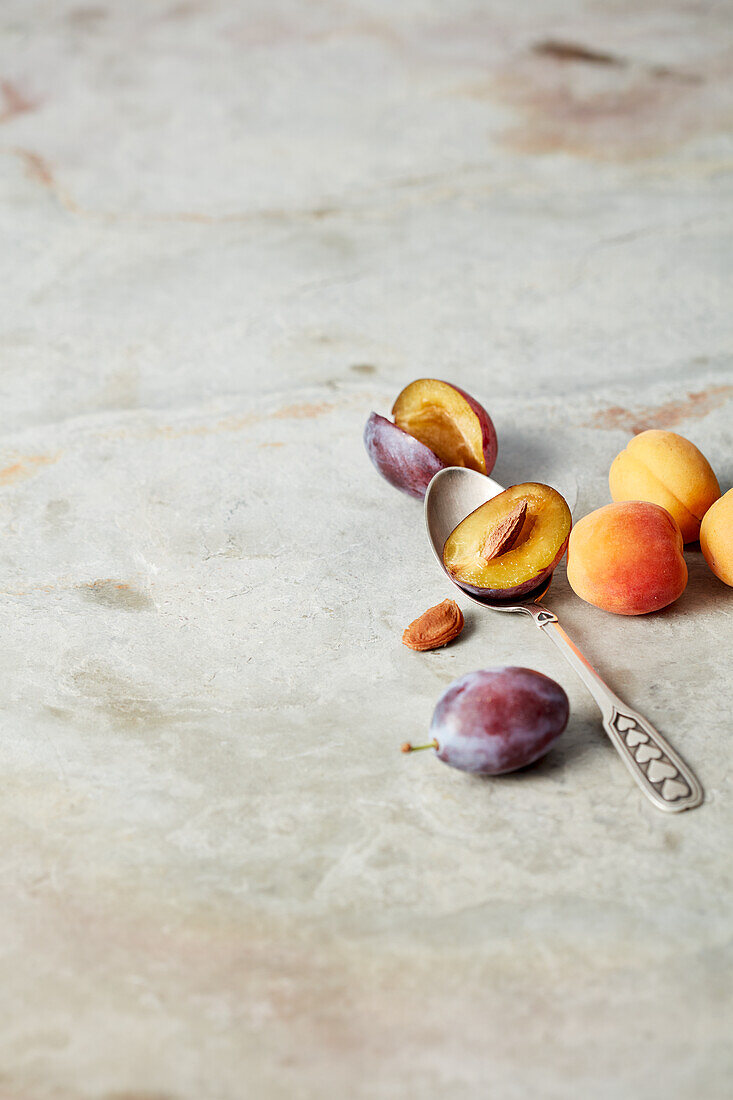 Fresh plums and apricots