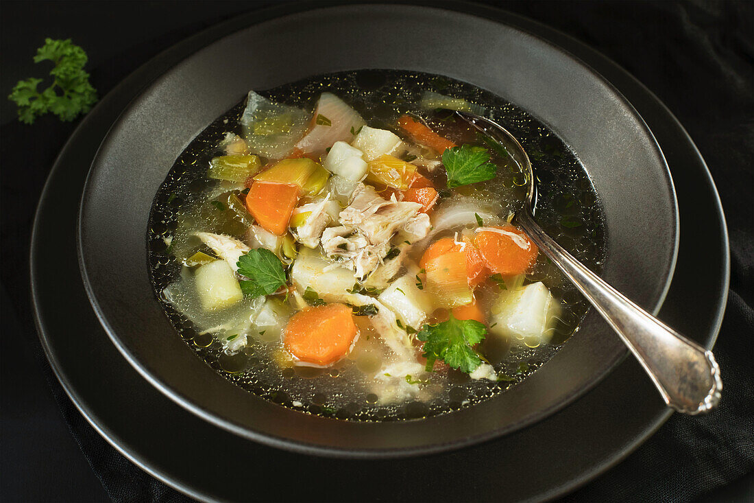 Clear chicken soup with vegetables