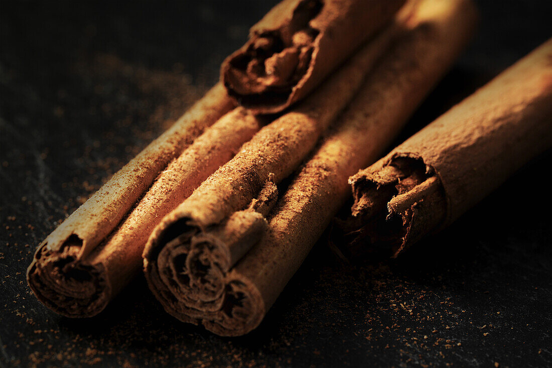 Close-up of Ceylon cinnamon sticks and powder