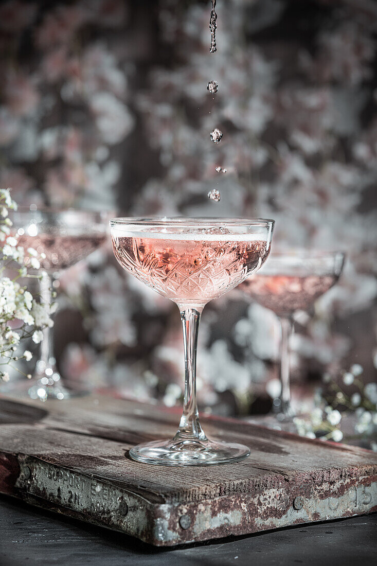 Rosé champagne is poured into glasses