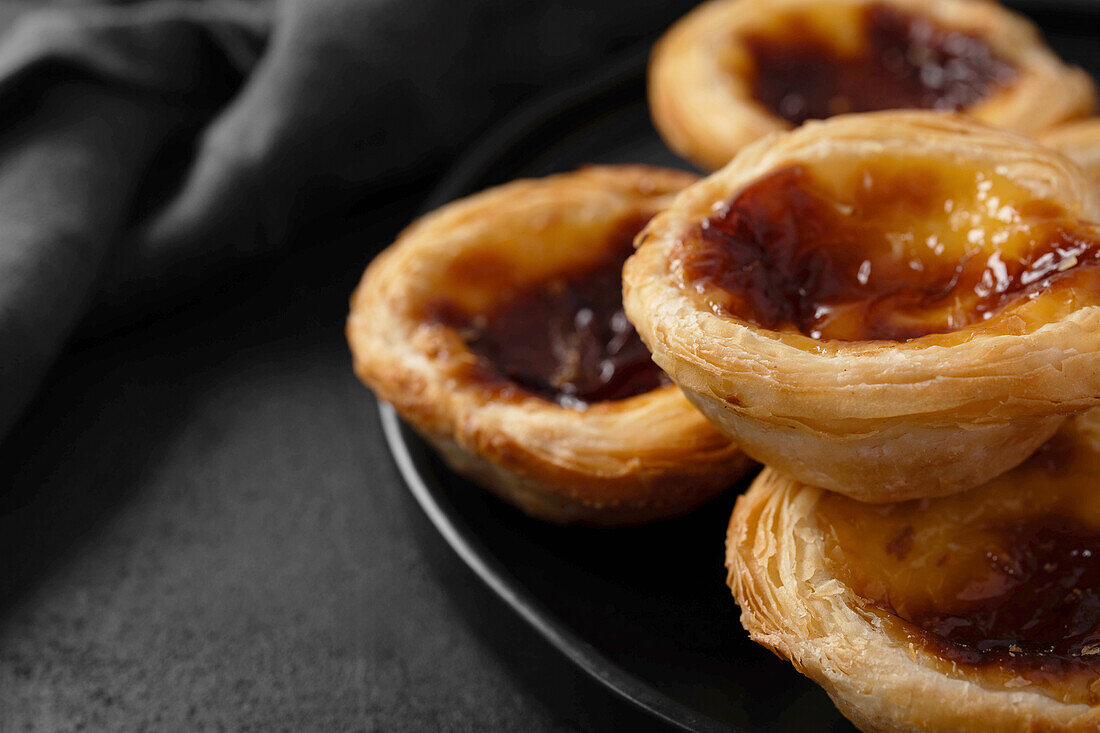 Close-up of a plate of Portuguese custard tarts