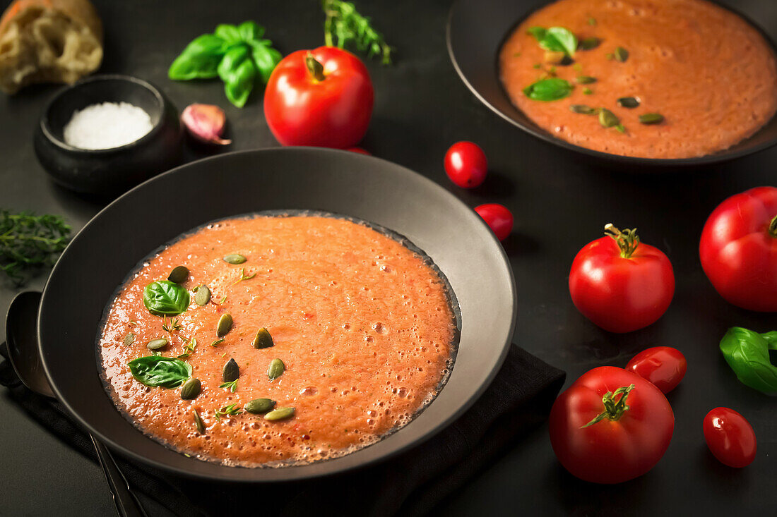 Tomato soup with basil and pumpkin seeds