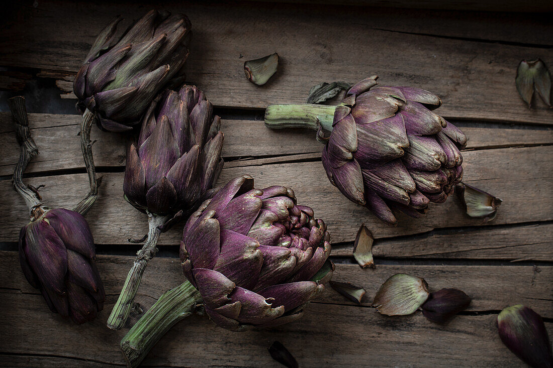 Artichokes on a wooden background