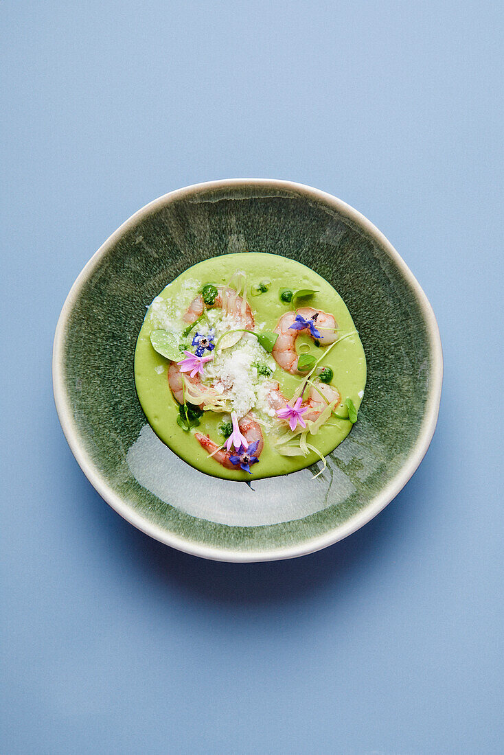 Cold avocado soup with prawns