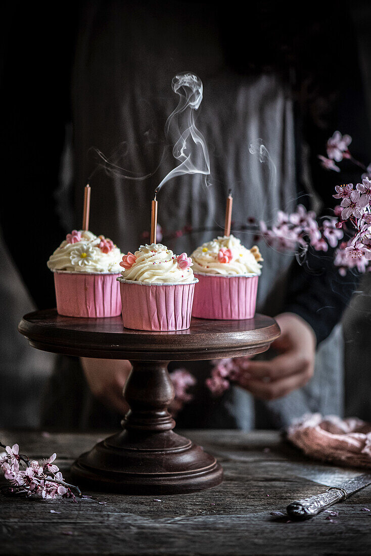 Vanilla cupcakes with candles