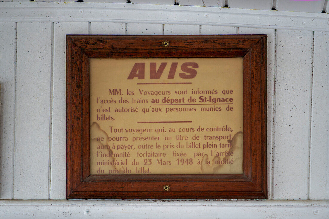 Warning informing about the fine in case of traveling without a valid ticket in the small Larrun or La Rhune train, in the Basque country, in France