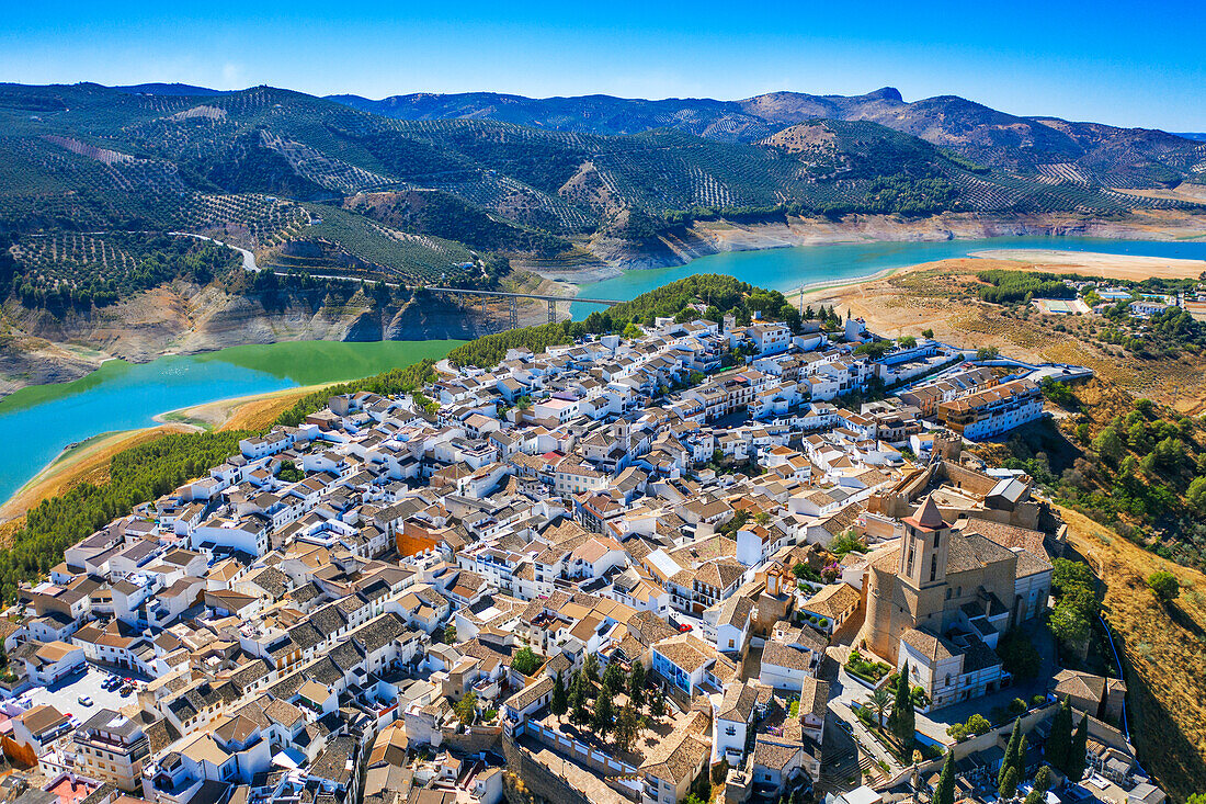 Aerial view of Iznajar village town reservoir and cemetry in Cordoba province, Andalusia, southern Spain.
