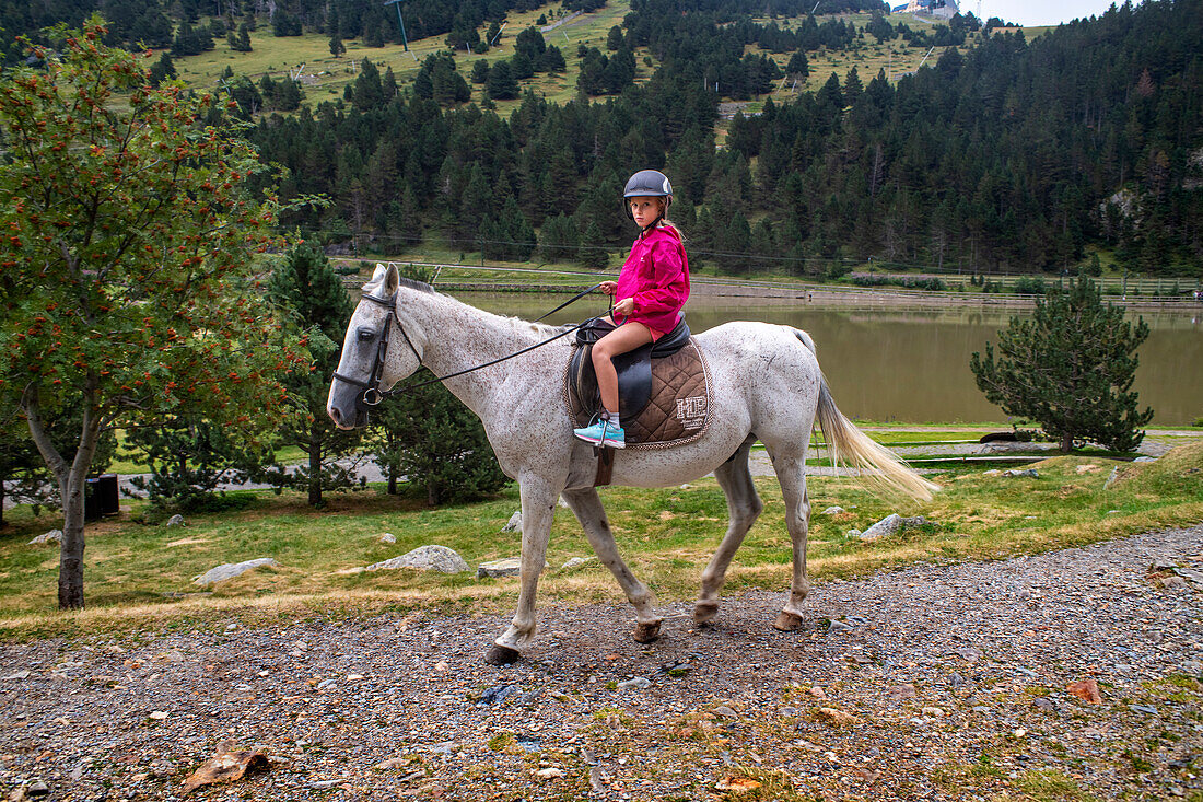 Horse riding in Vall de Nuria Sanctuary in the catalan pyrenees, Spain
