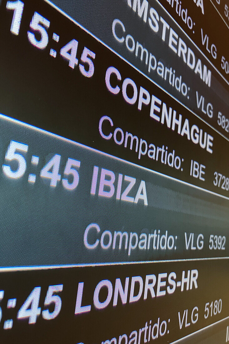 Departure information boards in Madrid Airport, Spain