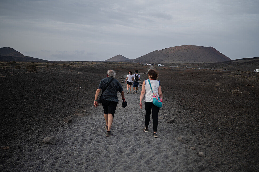 Volcan del Cuervo (Crow volcano) a crater explored by a loop trail in a barren, rock-strewn landscape