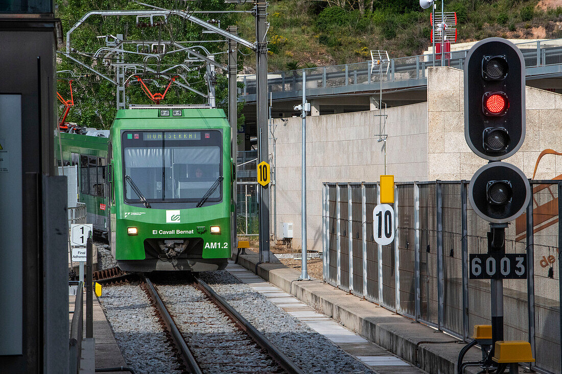 Monistrol Central train station and Cremallera de Montserrat rack railway train. Monistrol de Montserrat, Spain