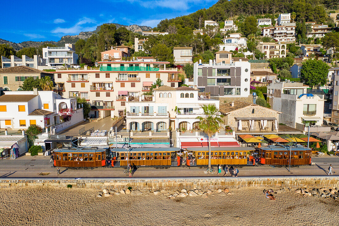 Aerial view of the vintage tram at the Port de Soller village. The tram operates a 5kms service from the railway station in the Soller village to the Puerto de Soller, Soller Majorca, Balearic Islands, Spain, Mediterranean, Europe.