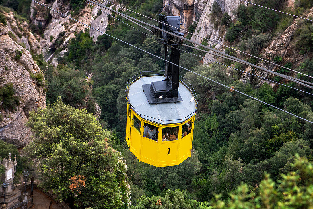 The yellow cabin on the Aeri de Montserrat, a cable car that takes visitors up to the Santa Maria monastery, in Barcelona, Catalonia, Spain