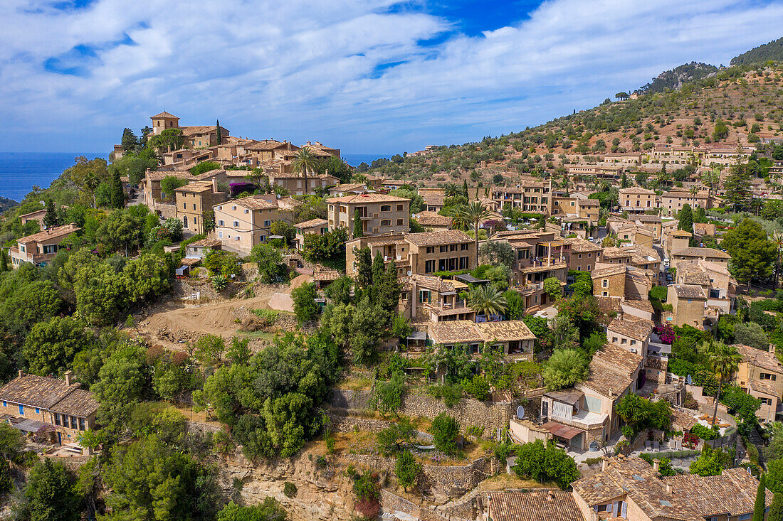 Aerial view of the hilltop village of Deia, Deya Municipality, Mallorca, Balearic Islands, Spain