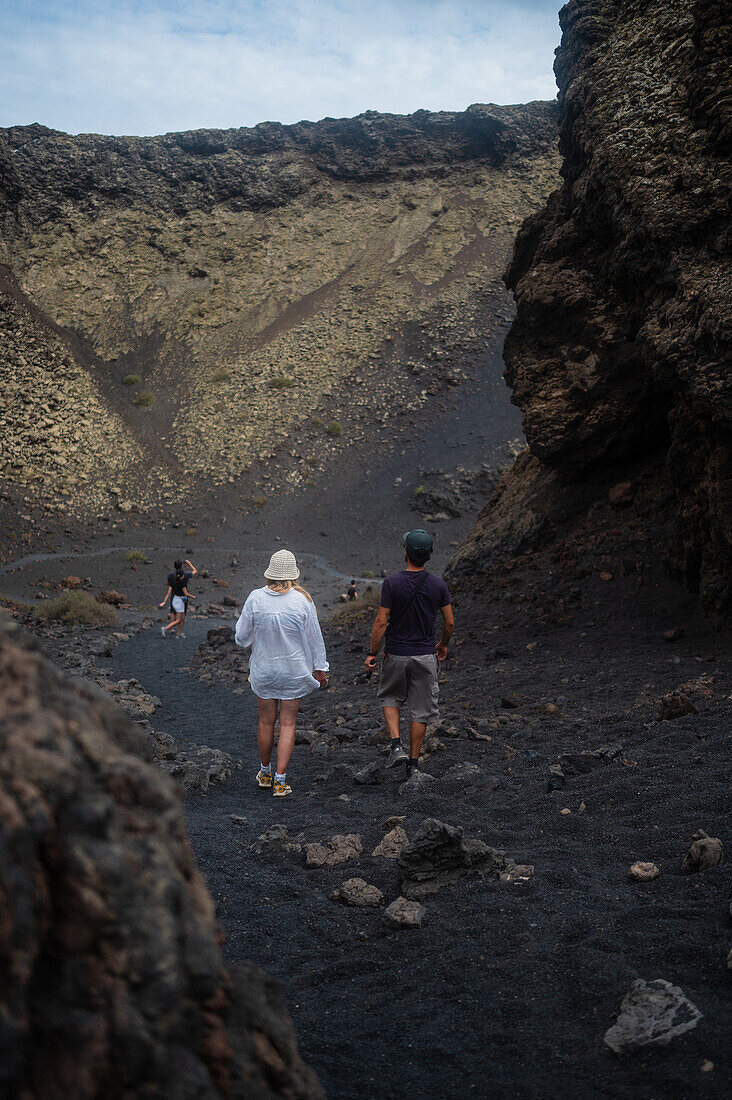 Volcan del Cuervo (Crow volcano) a crater explored by a loop trail in a barren, rock-strewn landscape