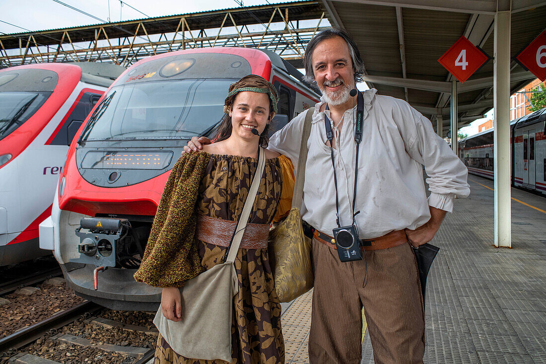 Actors performing Don Quixote de la Mancha and Dulcinea del Toboso inside the Cervantes Train between Atocha train Station and Alcala de Henares, Madrid Spain