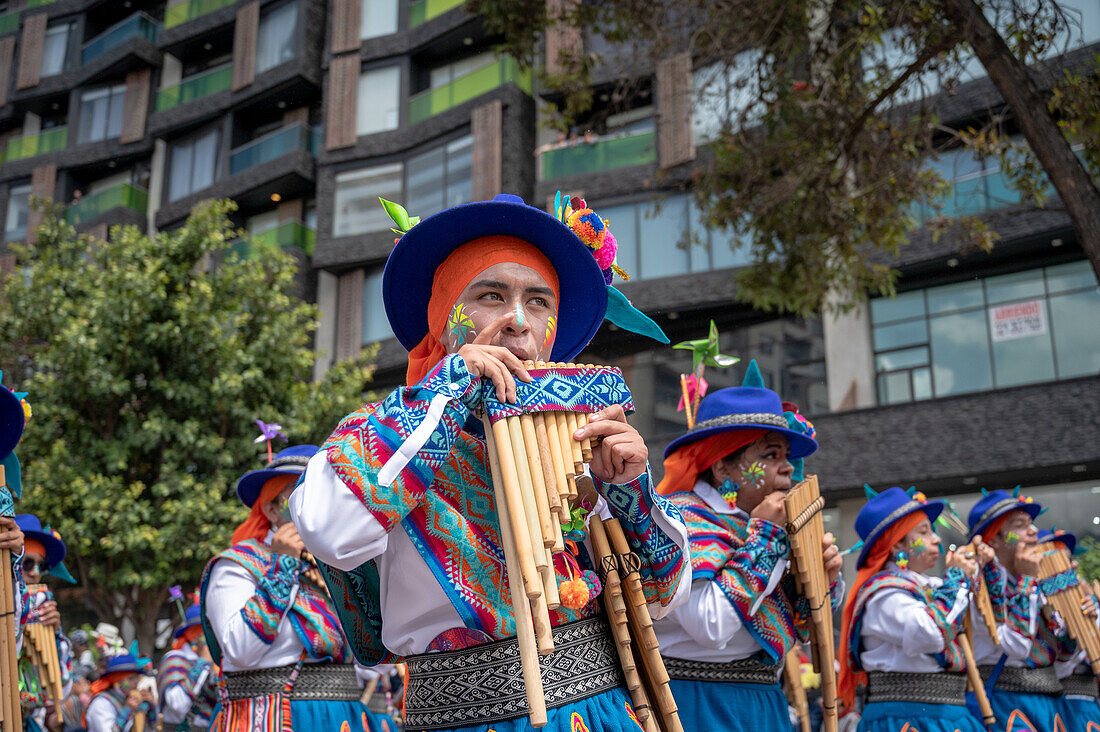 Different choreographic groups walk the path on the second day of the Blacks and Whites' Carnival. Pasto, Nariño, January 3, 2024.