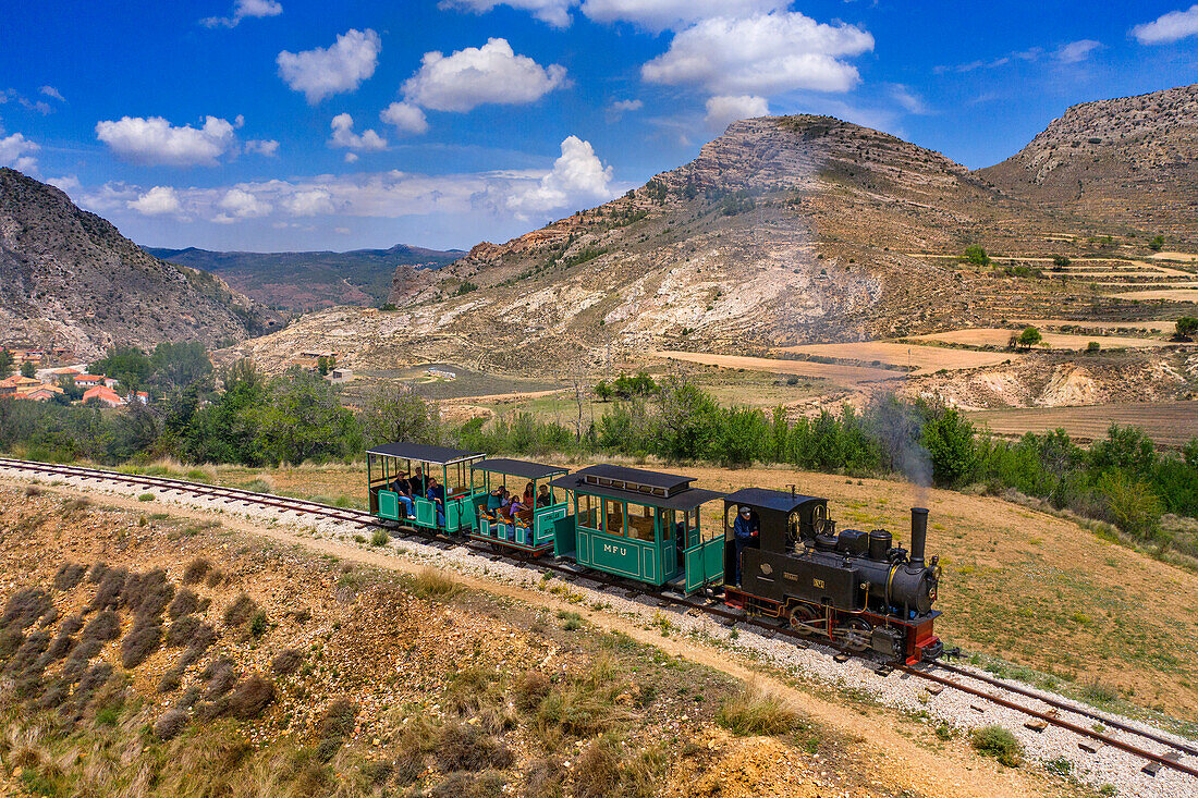 Aerial view of steam train, Utrillas mining train and Utrillas Mining and Railway Theme Park, Utrillas, Cuencas Mineras, Teruel, Aragon, Spain.
