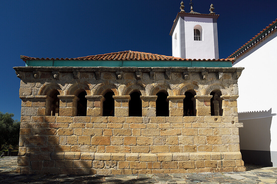 Domus Municipalis and the tower of the church of Santa Maria in Bragança, Portugal.
