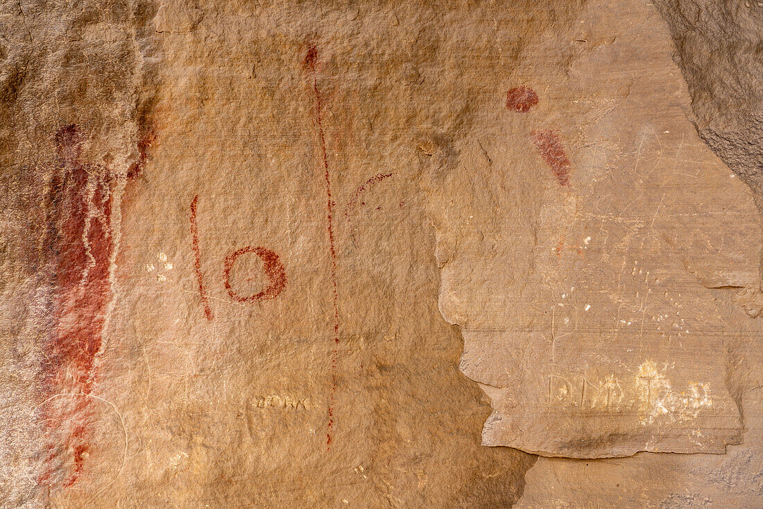 A vandalized pre-Hispanic Native American pictograph rock art panel in Nine Mile Canyon in Utah.