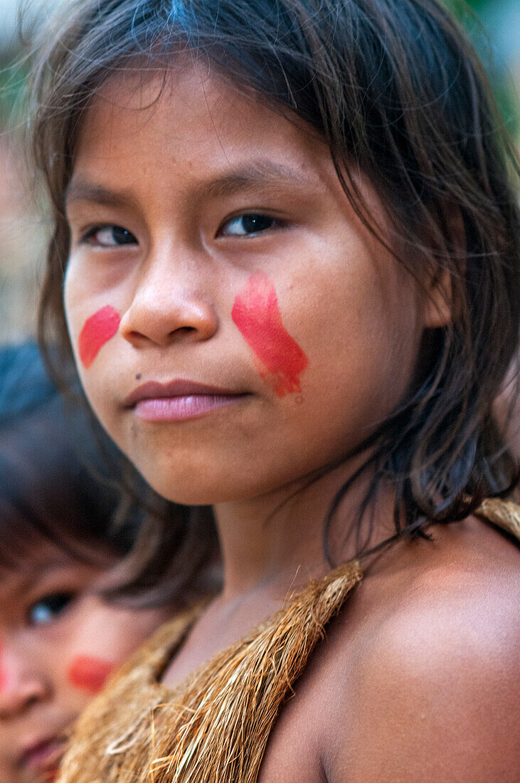 Portrait Yagua girls Indians living a traditional life near the Amazonian city of Iquitos, Peru.