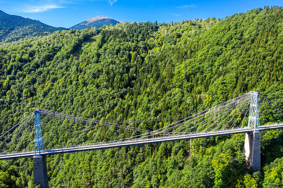 Aerial view of Petit train jaune train in the suspension bridge at Pont Gisclard bridge between Sauto and Planès, France.