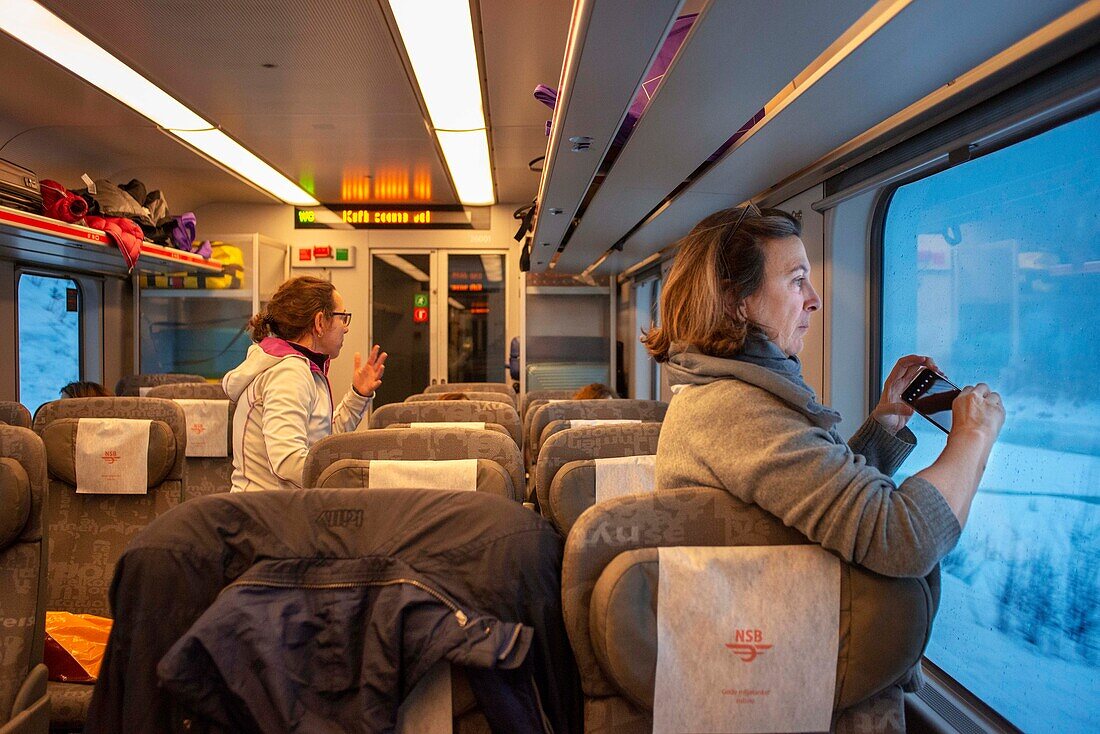 Inside Arctic circle train from Bodo to Trondheim, Nordland, Norway.