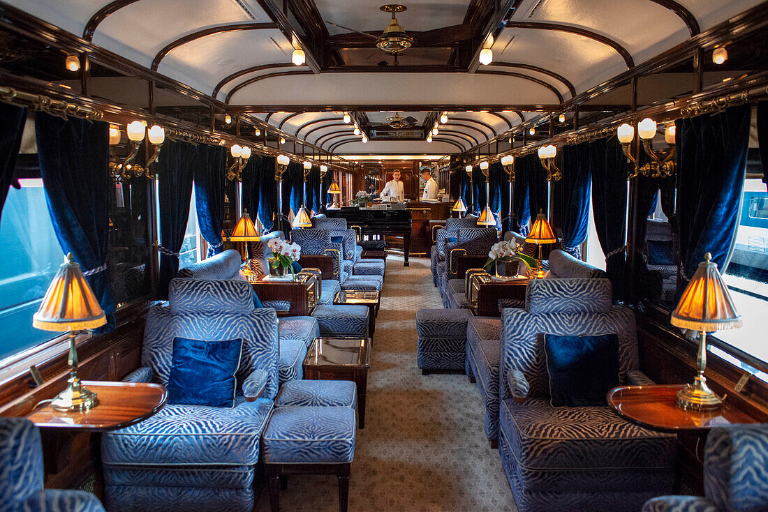 The art deco bar lounge wagon of the train Belmond Venice Simplon Orient Express luxury train.