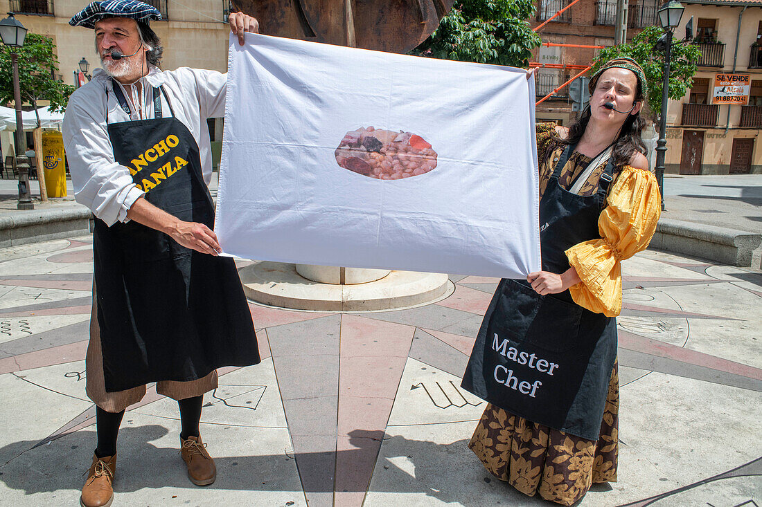 Actors playing Don Quixote de la Mancha through the center of the city of Alcala de Henares, Madrid Spain