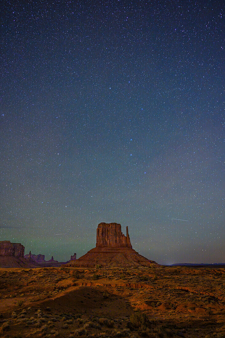Stars over West Mitten Butte in Monument Valley Navajo Tribal Park, Arizona.