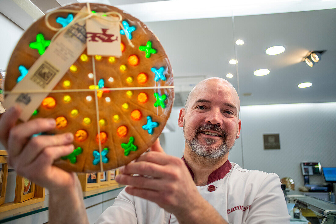 Barcelona, Maresme Coast, Canet de Mar village, Campassol bakery, Sweet modernist stained glass that is a symbol of Canet de Mar's identity paying homage to Lluís Domènech i Montaner. A sweetened art for a product based on tea paste dough with colored gelatin, which provides an optical illusion to those who taste it.