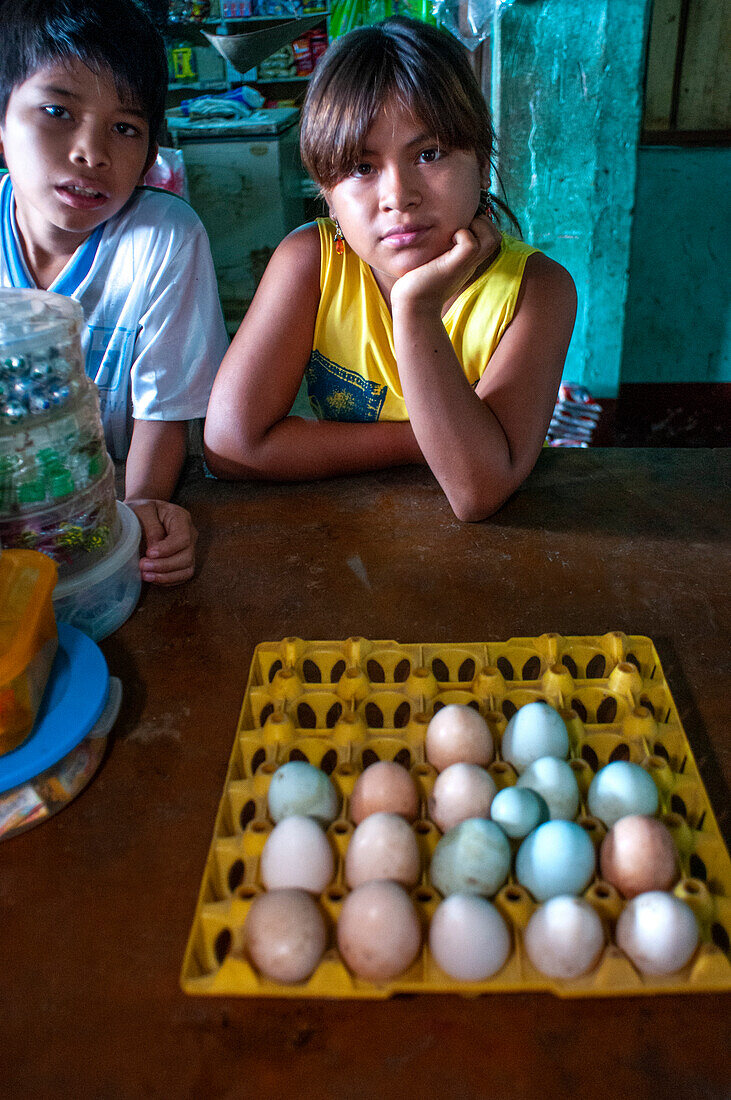 Market stall of amazonian river color eggs Indiana market Iqutios peruvian amazon, Loreto, Peru