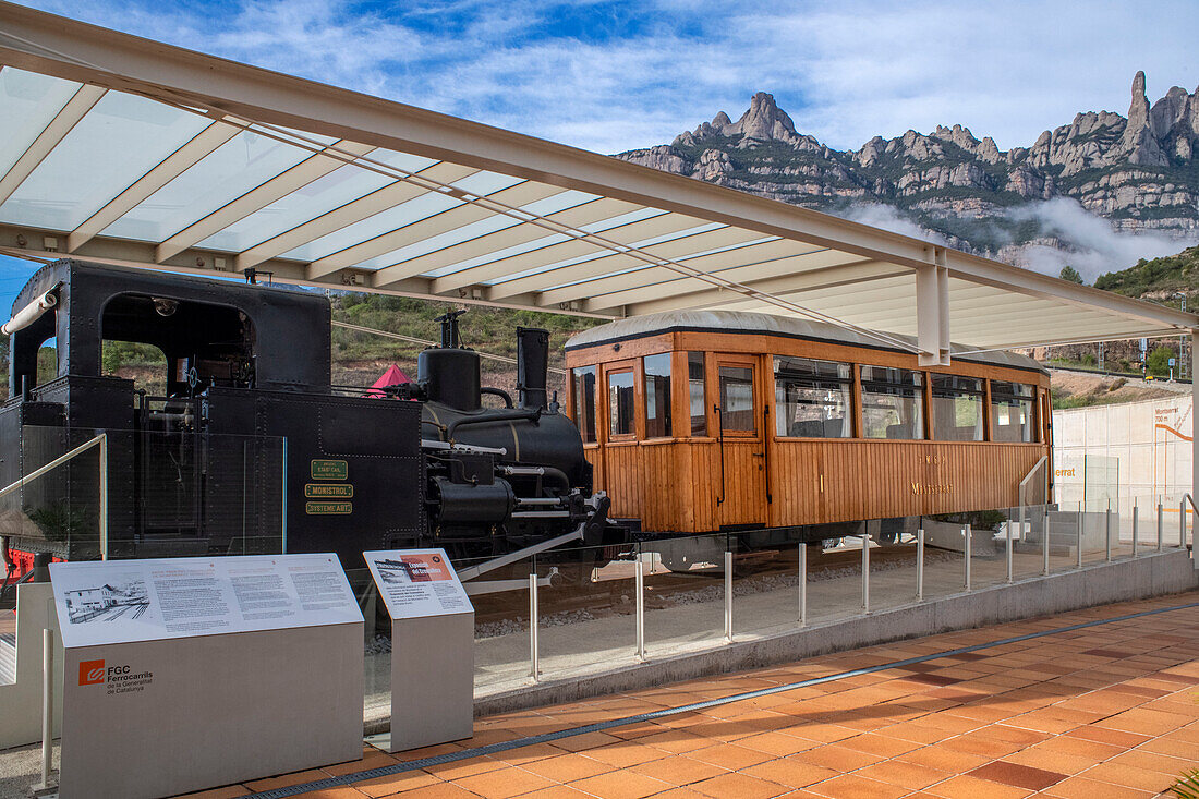 Old locomotive exhibition in Monistrol Central train station and Cremallera de Montserrat rack railway train. Monistrol de Montserrat, Spain