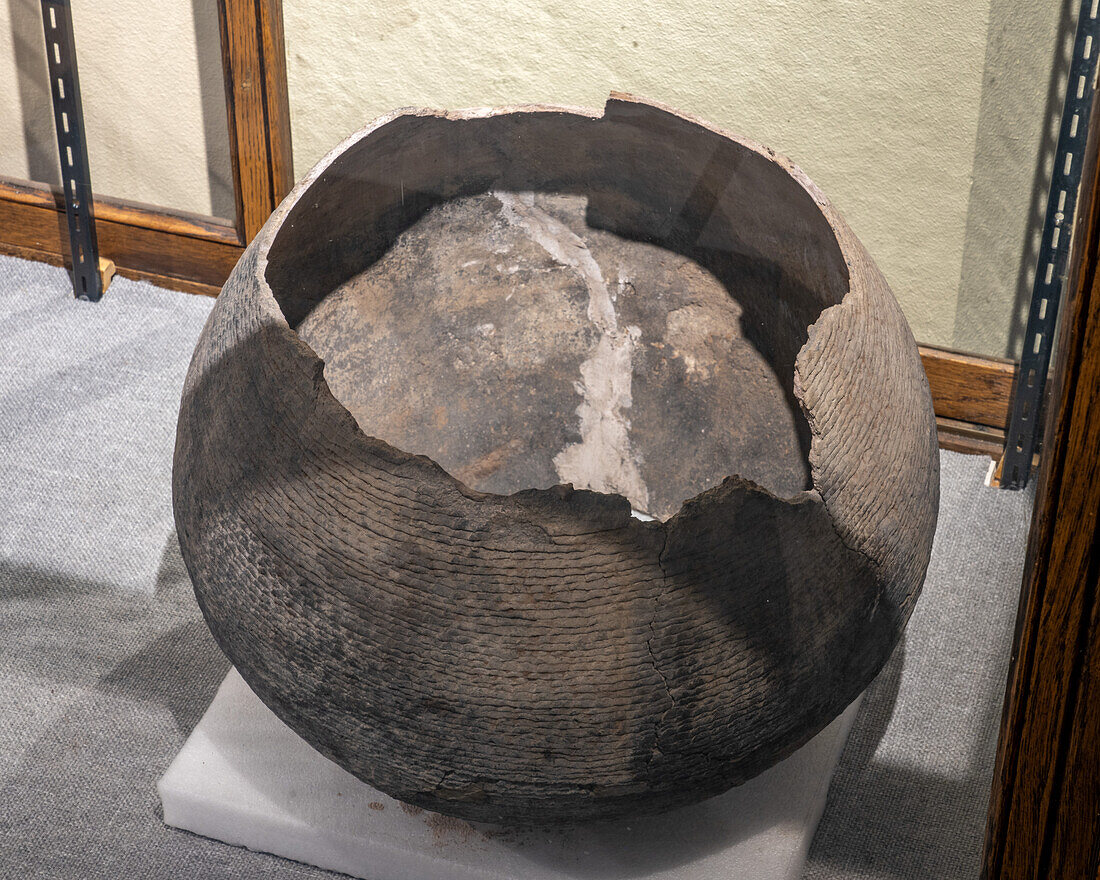 A large pre-Hispanic Native American corrugated pot in the USU Eastern Prehistoric Museum in Price, Utah.