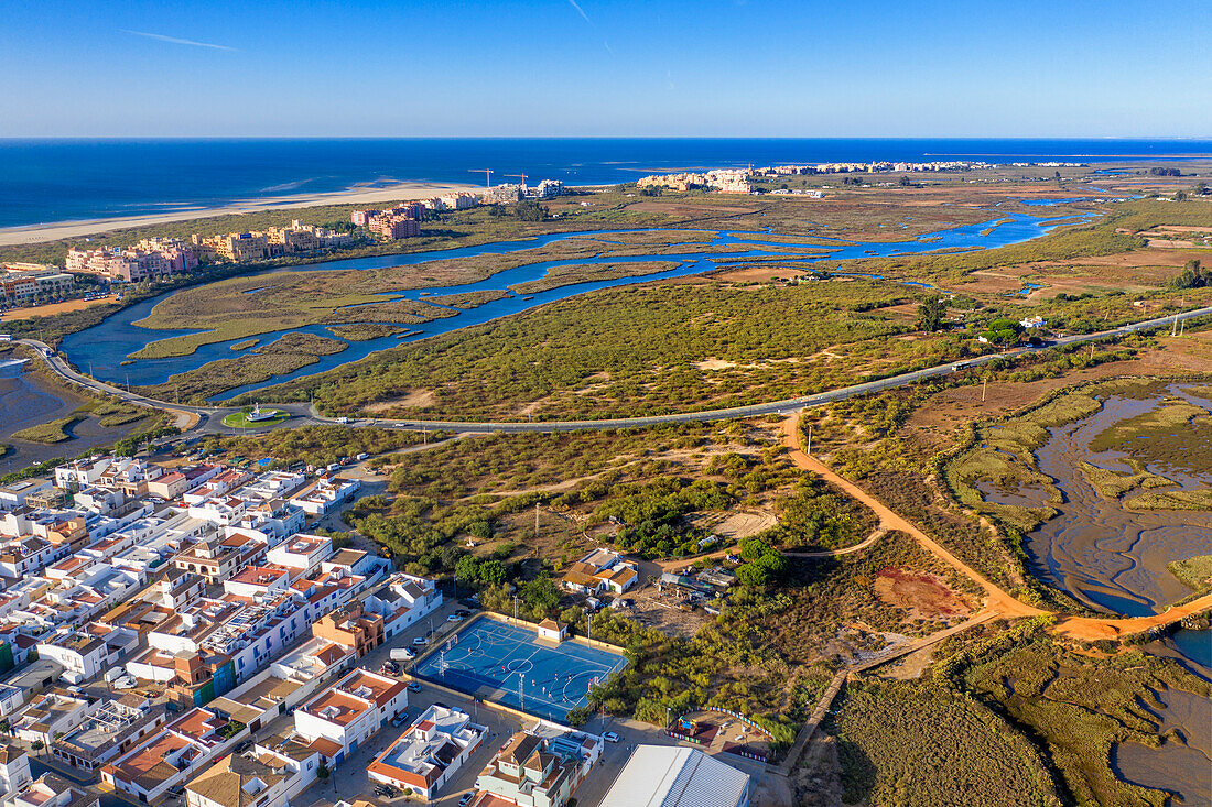 Aerial view of Salinas del Duque saltworks walking road marshes Isla Cristina, Huelva Province, Andalusia, southern Spain.